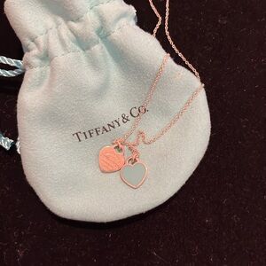 Beautiful Authentic Tiffany necklace and heart charms.